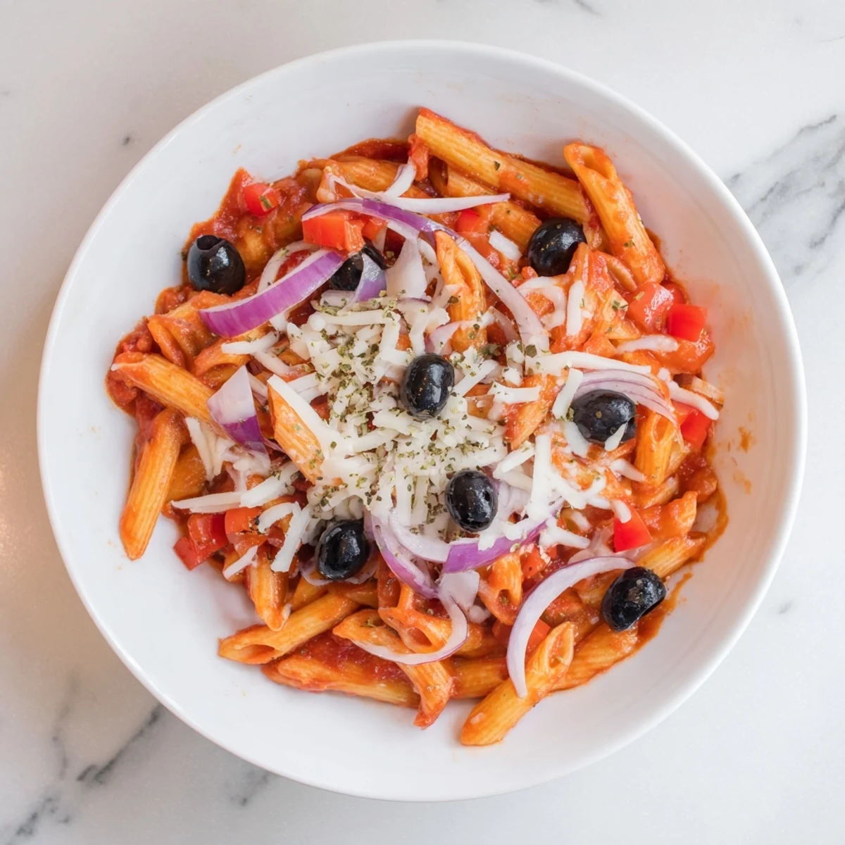 Close-up of bubbling One-Pot Pizza Pasta Express, loaded with melted mozzarella and pepperoni slices.