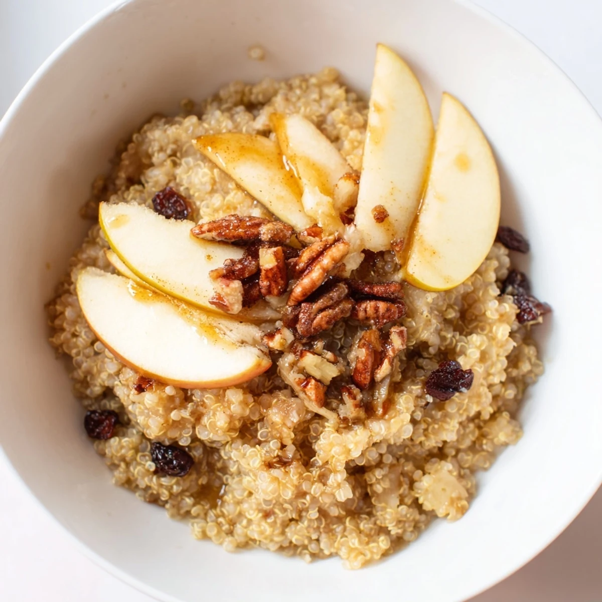 Enjoy a comforting bowl of Apple Cinnamon Quinoa, the perfect gluten-free breakfast creation.