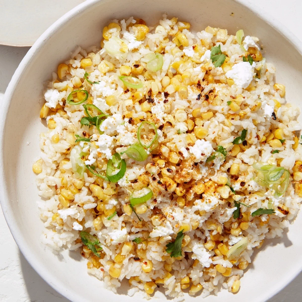 Close-up of savory Mexican Street Corn Rice, presenting zesty flavors and wholesome ingredients.