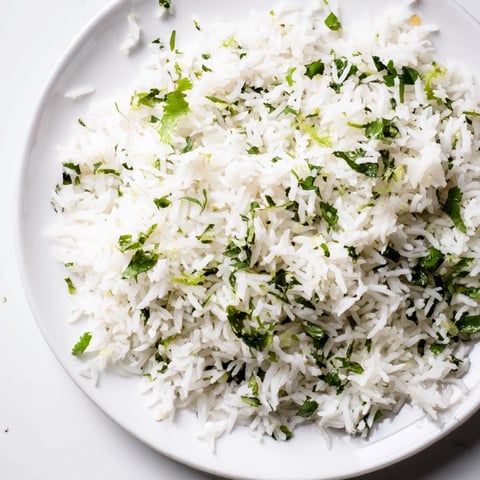 Fluffy, vibrant Cilantro Lime Rice: a delicious, zesty side dish ready to be served.