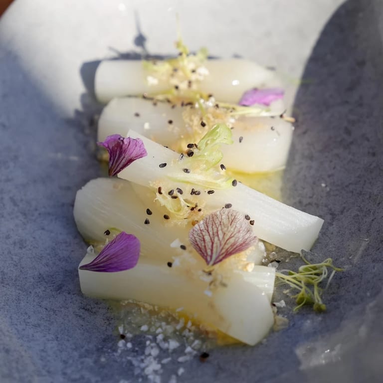 Crisp vegetables artfully arranged as The Tundra Trek, ready to be drizzled with lemon vinaigrette.