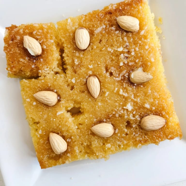 A close-up shot of the delicious and sweet Egyptian Basbousa dessert, perfect with coffee or tea.